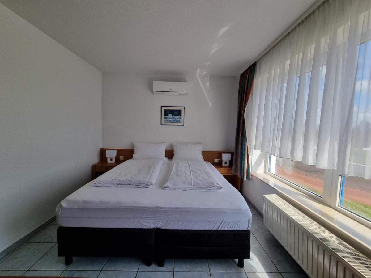 Erbenholz Hotel Laatzen Exteriör bild